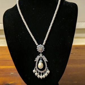 Beautiful clear rhinestones and artificial pearls